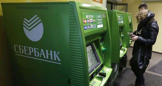Поменять 100 долларов на рубли в Сбербанке